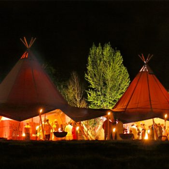 Tipis at night